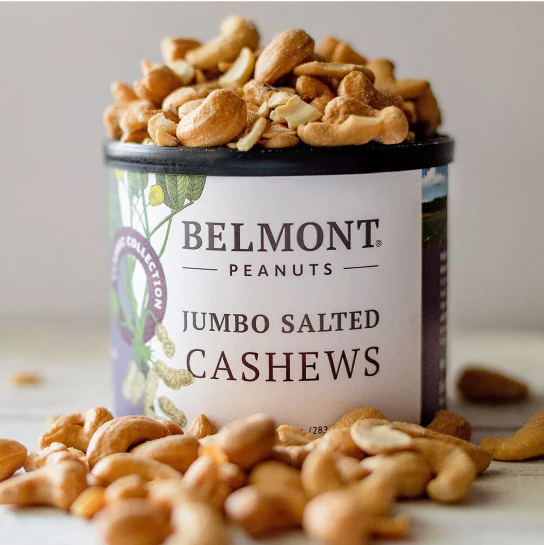 Nuts on top of a can labeled Belmont Peanuts, Jumbo Salted Cashews at The Tides Inn