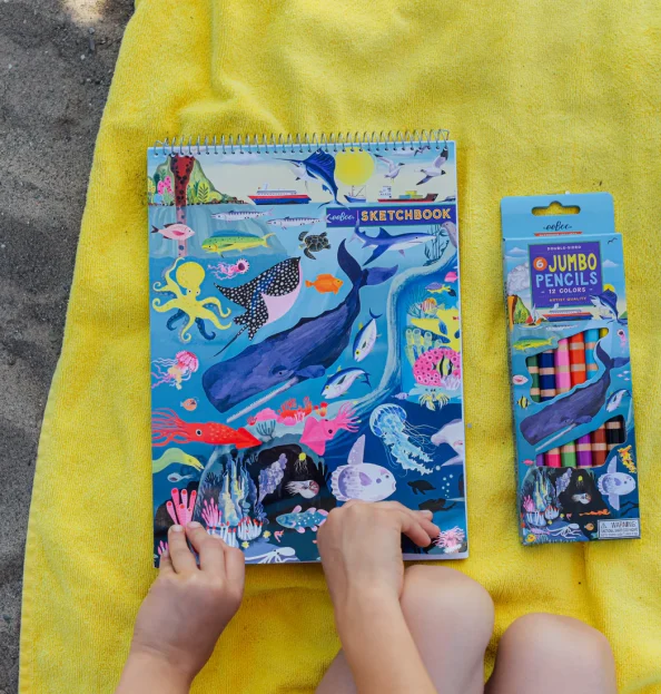 Kids sketchbook with marine creatures on the front and a pack of coloring pencils