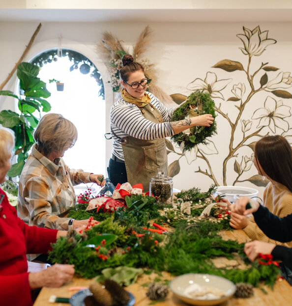 Holiday wreath craft at our irvington va resort with guests working on theirs